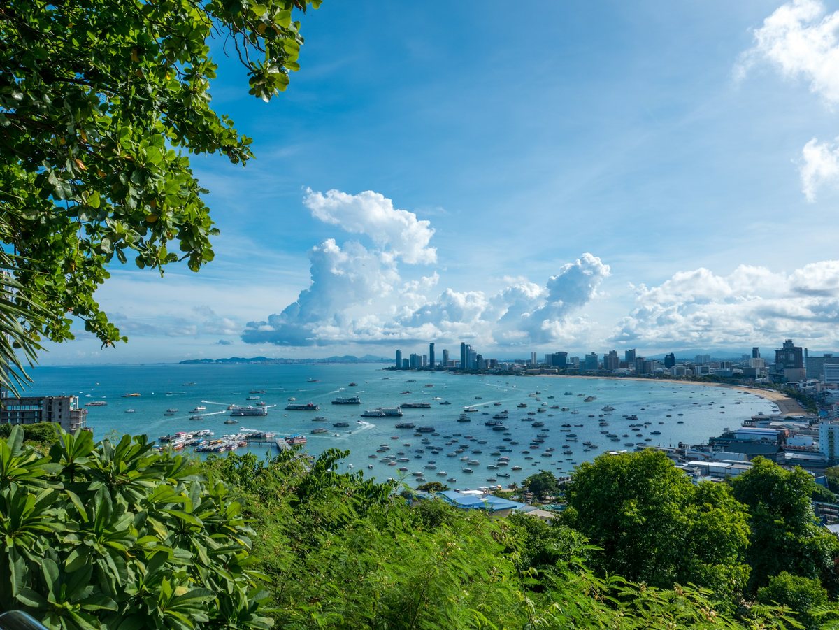 Pattaya Bay with boats and the city skyline